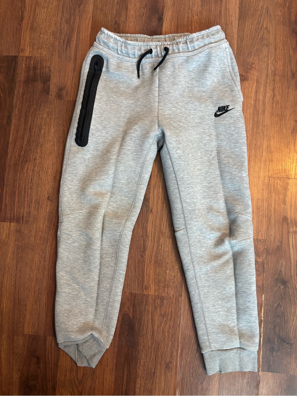 Nike Light Gray Kids Fleece Joggers with Black Trim good condition